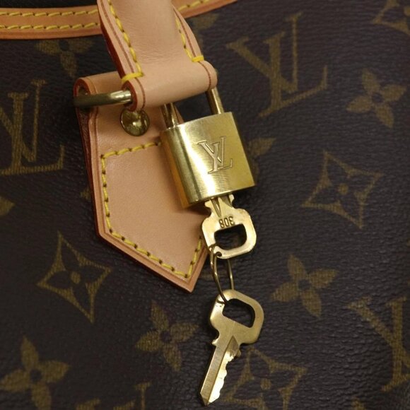 LOUIS VUITTON Monogram Alma Voyage GM Boston Bag - Picture 13 of 16